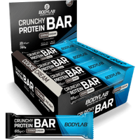 Crunchy Protein Bar Deluxe - 12x65g - Cookie Cream Flavouring Crunchy Protein Bar Deluxe - 12x65g - Cookie Cream Flavouring von Bodylab24