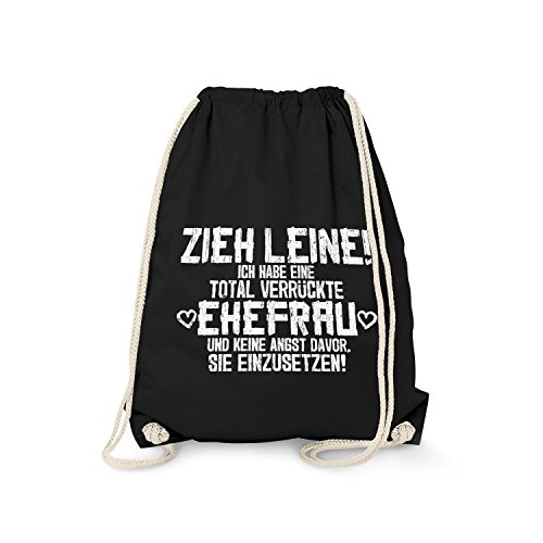 Fashionalarm Turnbeutel - Zieh Leine, ich Habe eine verrückte Ehefrau | Fun Rucksack mit lustigem Spruch als Geschenk Idee für Hochzeit Ehe Mann, Schwarz One Size Fashionalarm Turnbeutel - Zieh Leine, ich Habe eine verrückte Ehefrau | Fun Rucksack mit lustigem Spruch als Geschenk Idee für Hochzeit Ehe Mann, Schwarz One Size von Fashionalarm