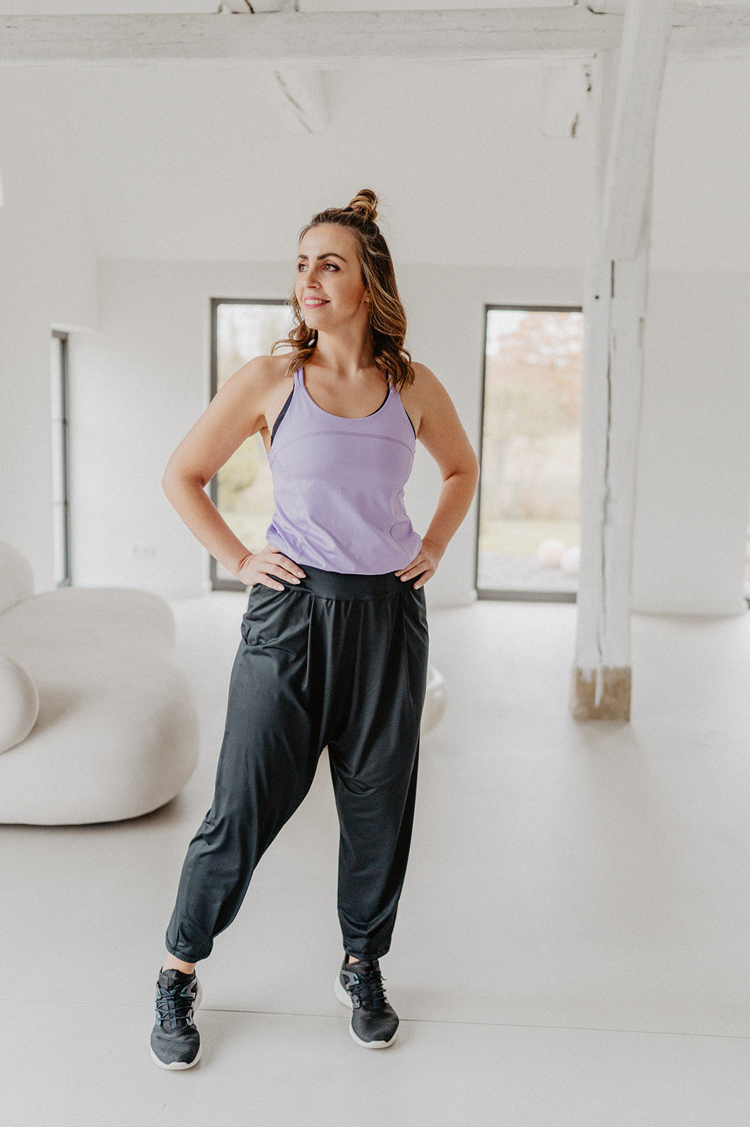 Konekto Move Jumpsuit schwarz mit flieder Konekto Move Jumpsuit schwarz mit flieder von Konekto