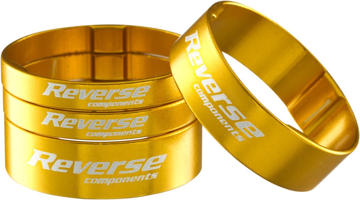 Reverse Reverse Alu Vorbau / SCS Spacer Set 1 1/8'' 2x 5mm 2x 10mm gold Lenkeradapter Reverse Reverse Alu Vorbau / SCS Spacer Set 1 1/8'' 2x 5mm 2x 10mm gold Lenkeradapter von Reverse