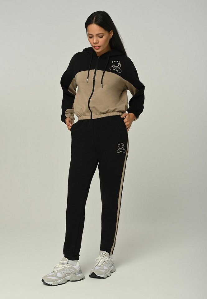 Tom Barron Trainingsanzug mit Yiemboidery-Design Tom Barron Trainingsanzug mit Yiemboidery-Design von Tom Barron