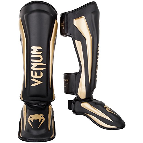 Venum Elite Boxen Schienbeinschutz, Schwarz / Gold, XL Venum Elite Boxen Schienbeinschutz, Schwarz / Gold, XL von Venum