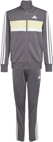 adidas Unisex Kinder SEASONAL ESSENTIALS TIBERIO 3 STRIPES TRICOT TRACKSUIT, grey strata/white/powder yellow, 9-10 Years adidas Unisex Kinder SEASONAL ESSENTIALS TIBERIO 3 STRIPES TRICOT TRACKSUIT, grey strata/white/powder yellow, 9-10 Years von adidas