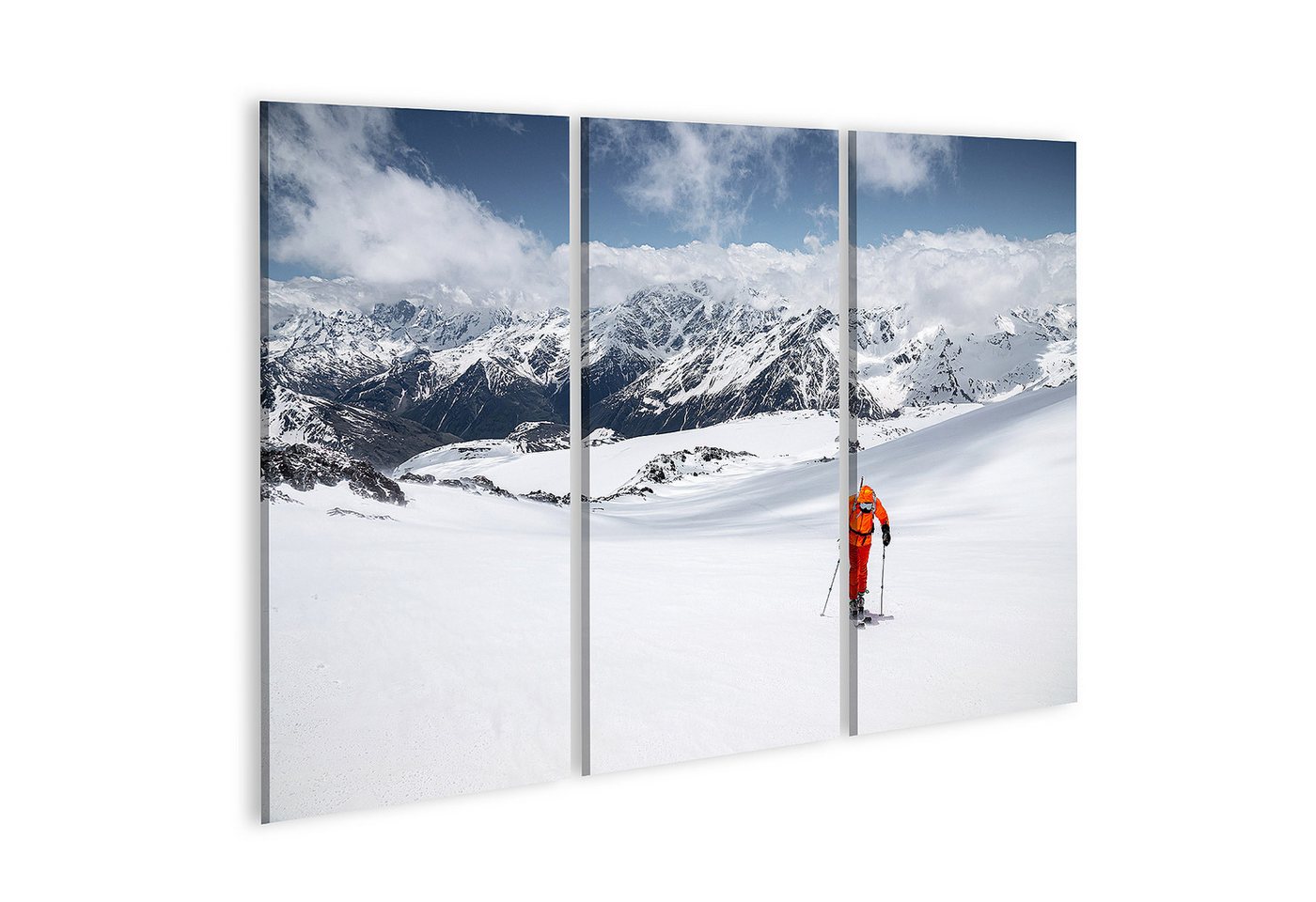 islandburner Leinwandbild Freerider im gelben Skianzug mit einem Rucksack auf den Schu Bilder islandburner Leinwandbild Freerider im gelben Skianzug mit einem Rucksack auf den Schu Bilder von islandburner